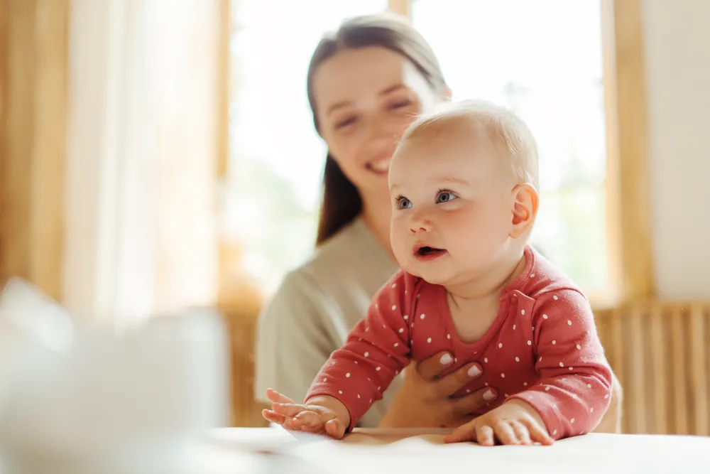 Mother and baby in a moment of early language development and listening