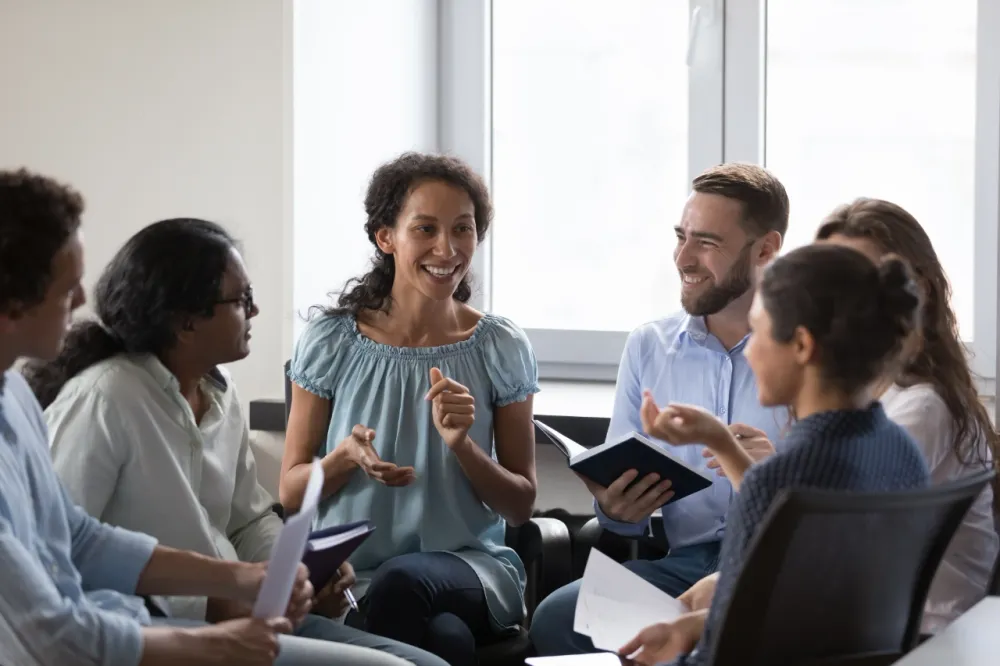 Group of people having a natural conversation - speaking confidently without accent getting in the way